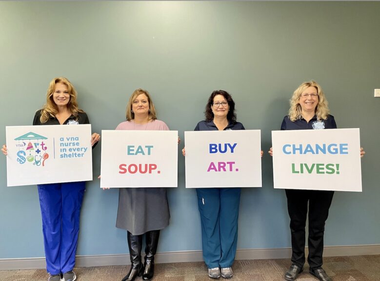 VNA shelter nurses holding signs for the Art & Soup event