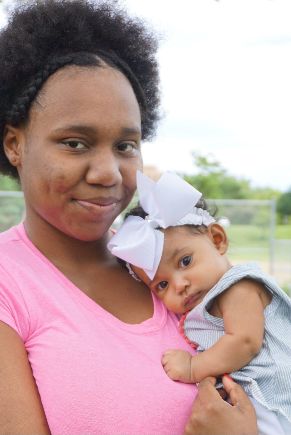 VNA parenting support services mother holding baby on chest